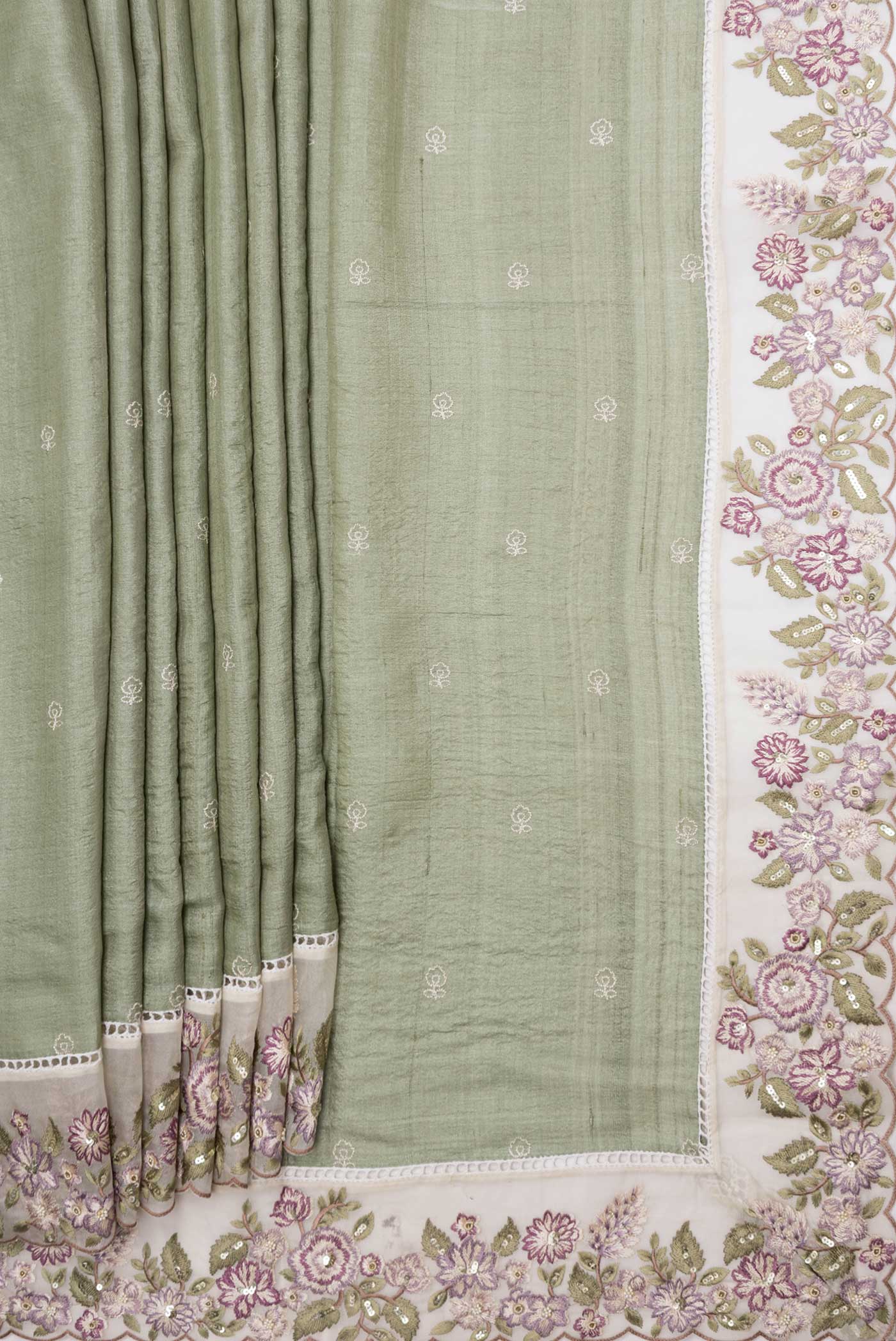 Pleats and pallu of Sage Green Tussar Silk Saree with Embroidery on the body and Embroidery Border