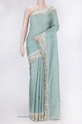 Pista Green Dual Tone Tussar Silk Saree with Embroidery on the body and Embroidery Border.  displayed on a mannequin