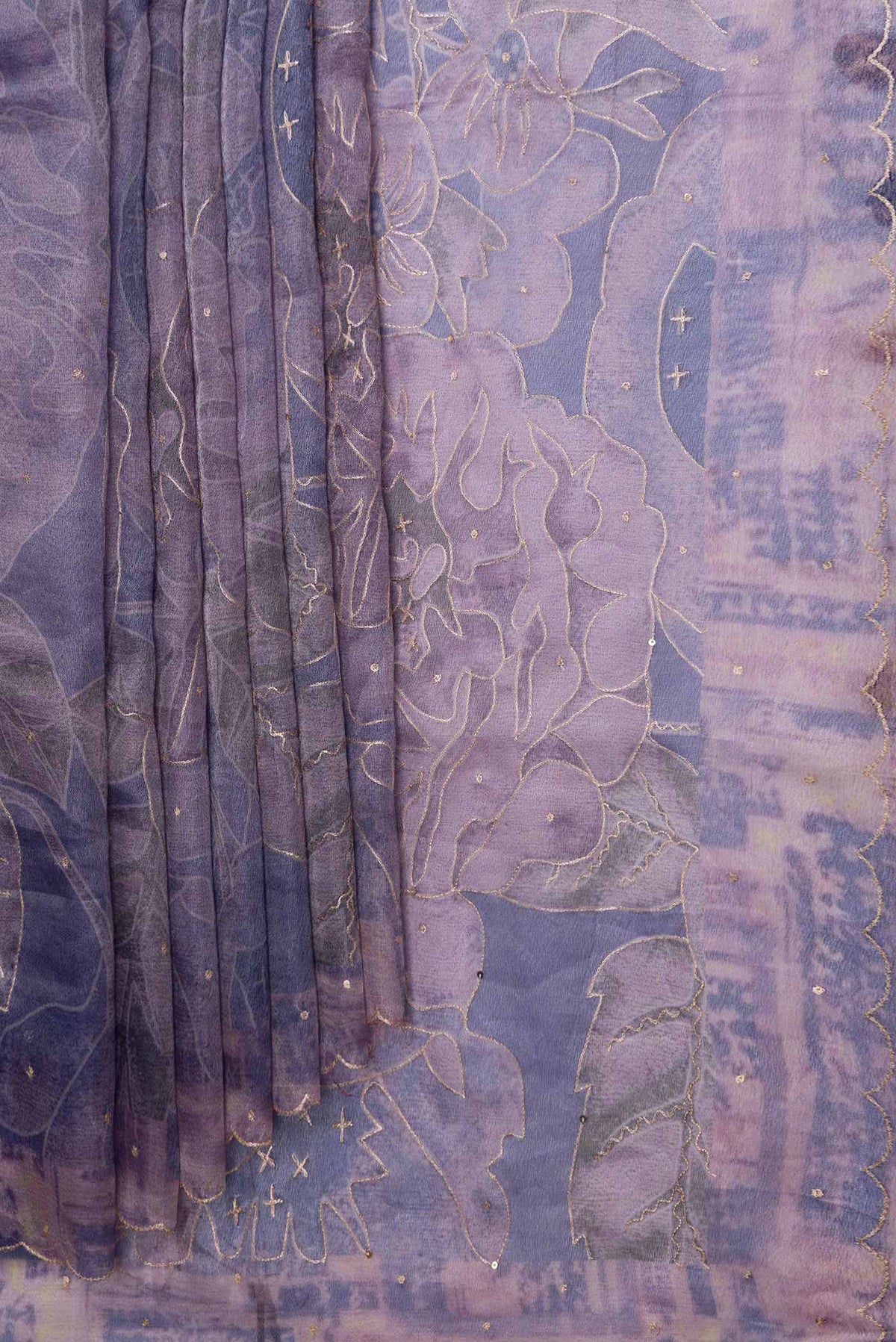 Pleats and pallu of Lavender Dual Tone Organza Silk Saree with Embroidery on the body and Embroidery Border