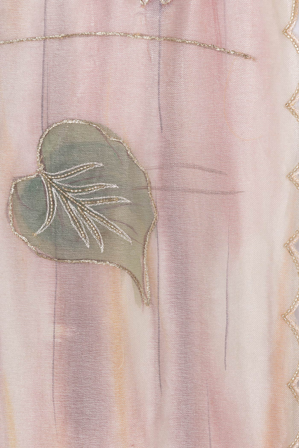 Border image of Rose Gold Dual Tone Organza Silk Saree with Embroidery on the body and Embroidery Border. 