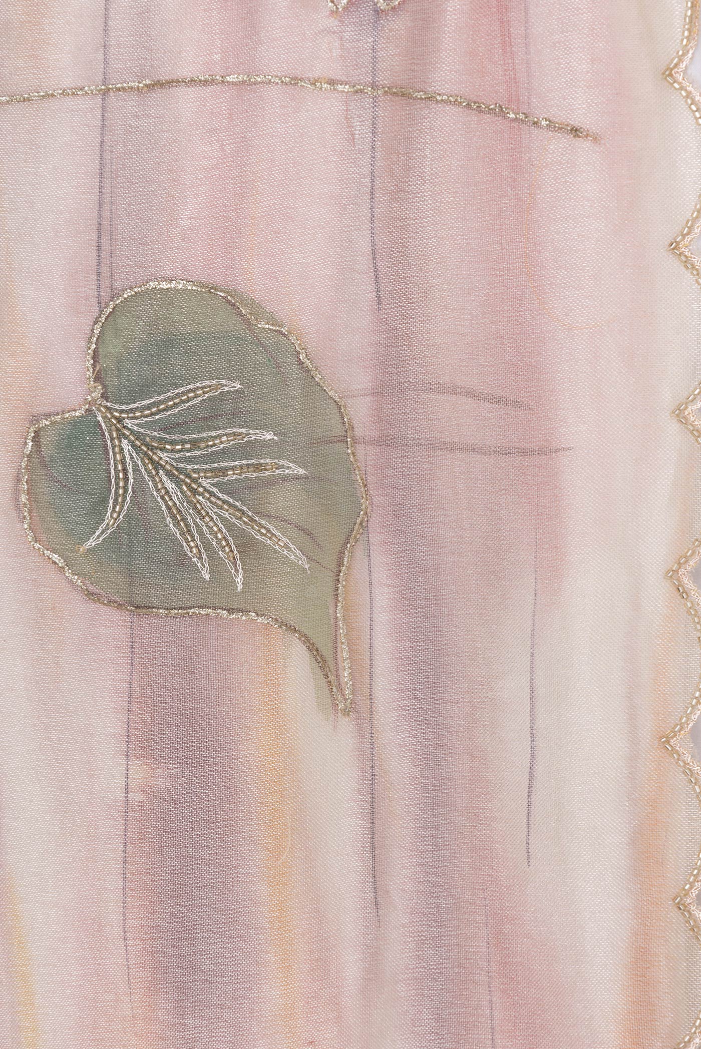 Border image of Rose Gold Dual Tone Organza Silk Saree with Embroidery on the body and Embroidery Border. 