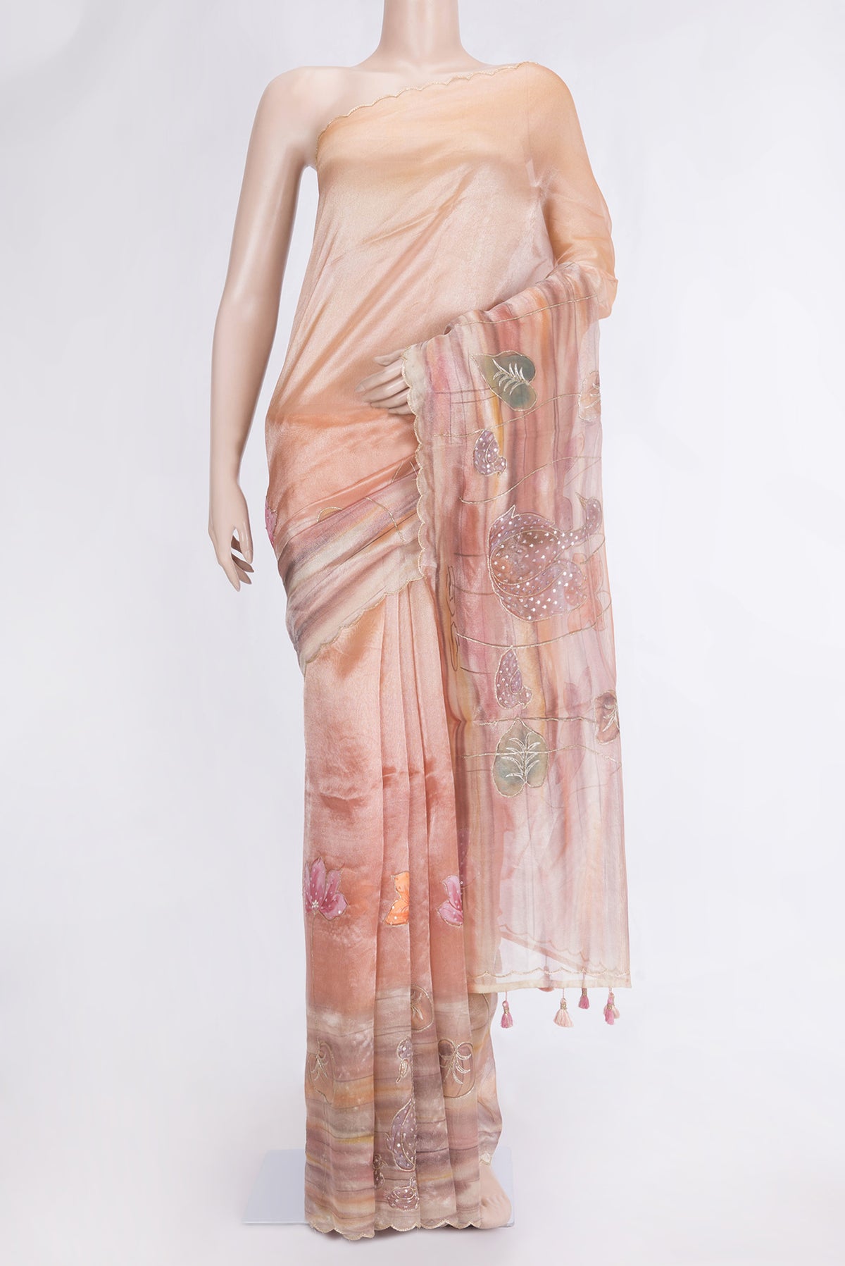 Rose Gold Dual Tone Organza Silk Saree with Embroidery on the body and Embroidery Border.  displayed on a mannequin