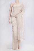 Beige Dual Tone Organza Silk Saree with Embroidery on the body and Embroidery Border.  displayed on a mannequin