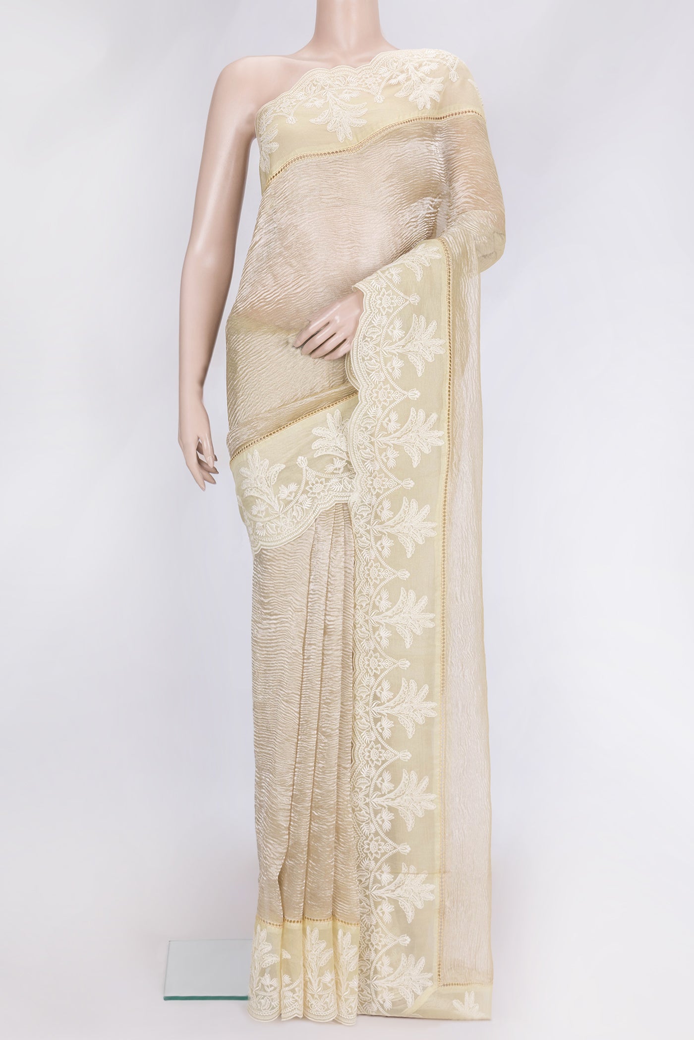 Beige Dual Tone Organza Silk Saree with Plain Body and Fancy Border.  displayed on a mannequin