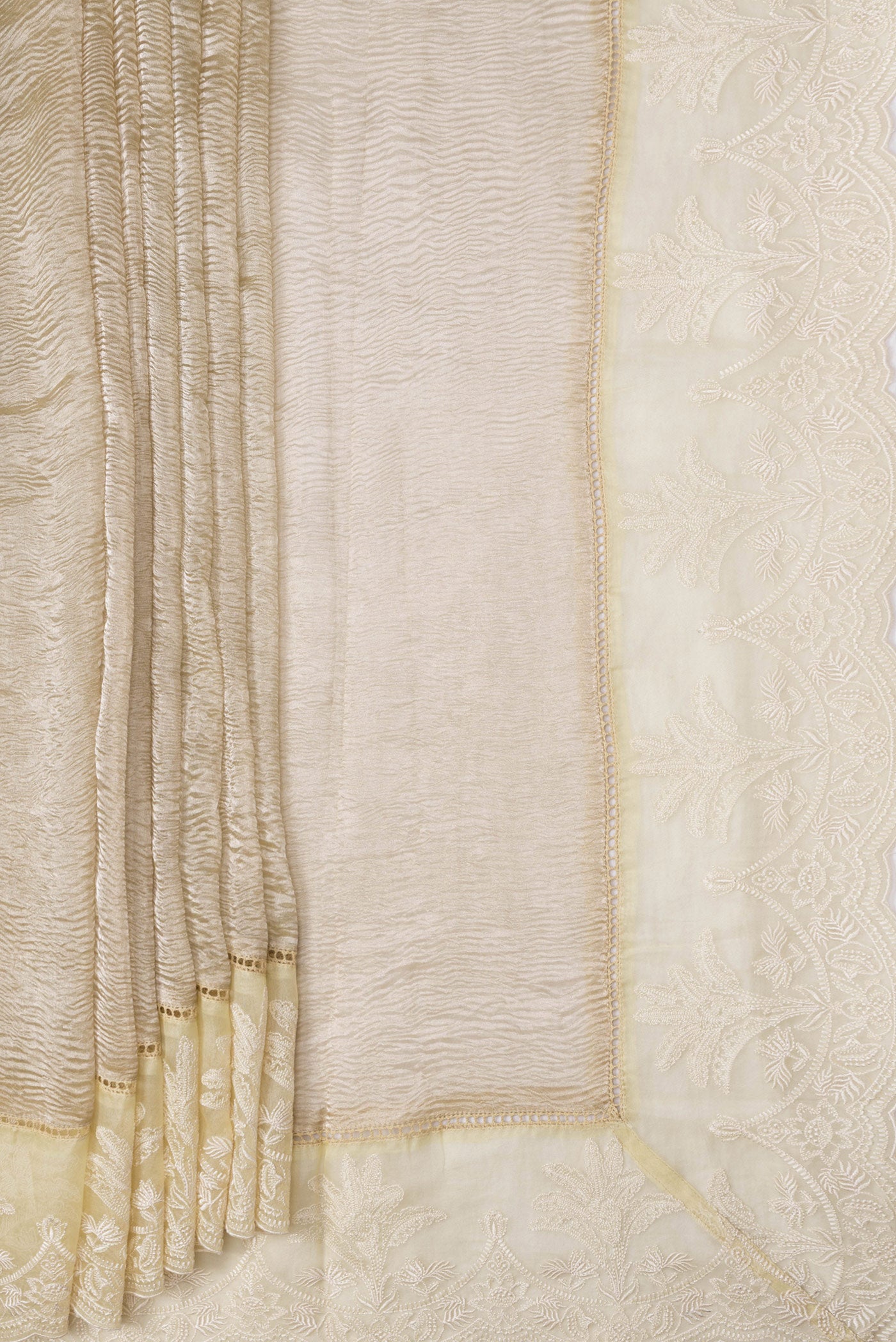 Pleats and pallu of Beige Dual Tone Organza Silk Saree with Plain Body and Fancy Border. 