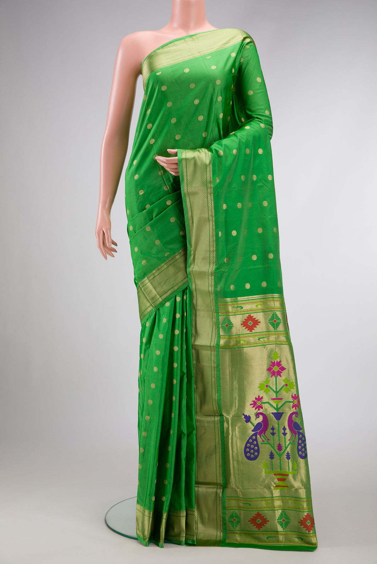 Parrot Green Dual Tone Paithani Silk Saree with Zari Butta on the body and Zari And Thread Border.  displayed on a mannequin