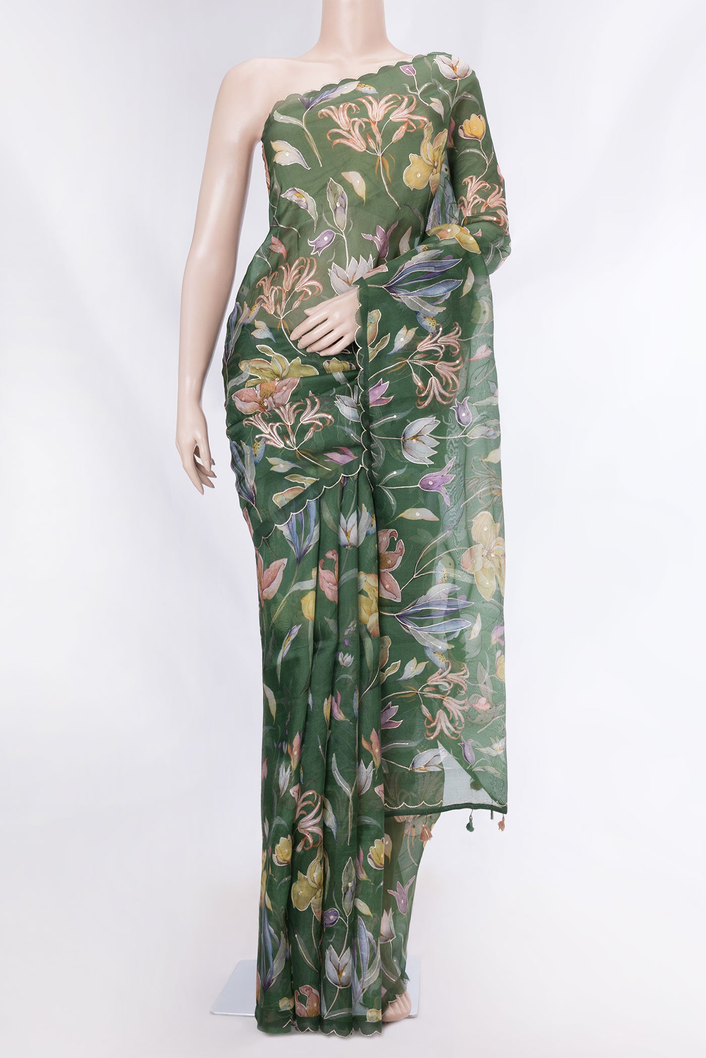 Green Dual Tone Organza Silk Saree with Printed design on the body and Embroidery Border displayed on a mannequin