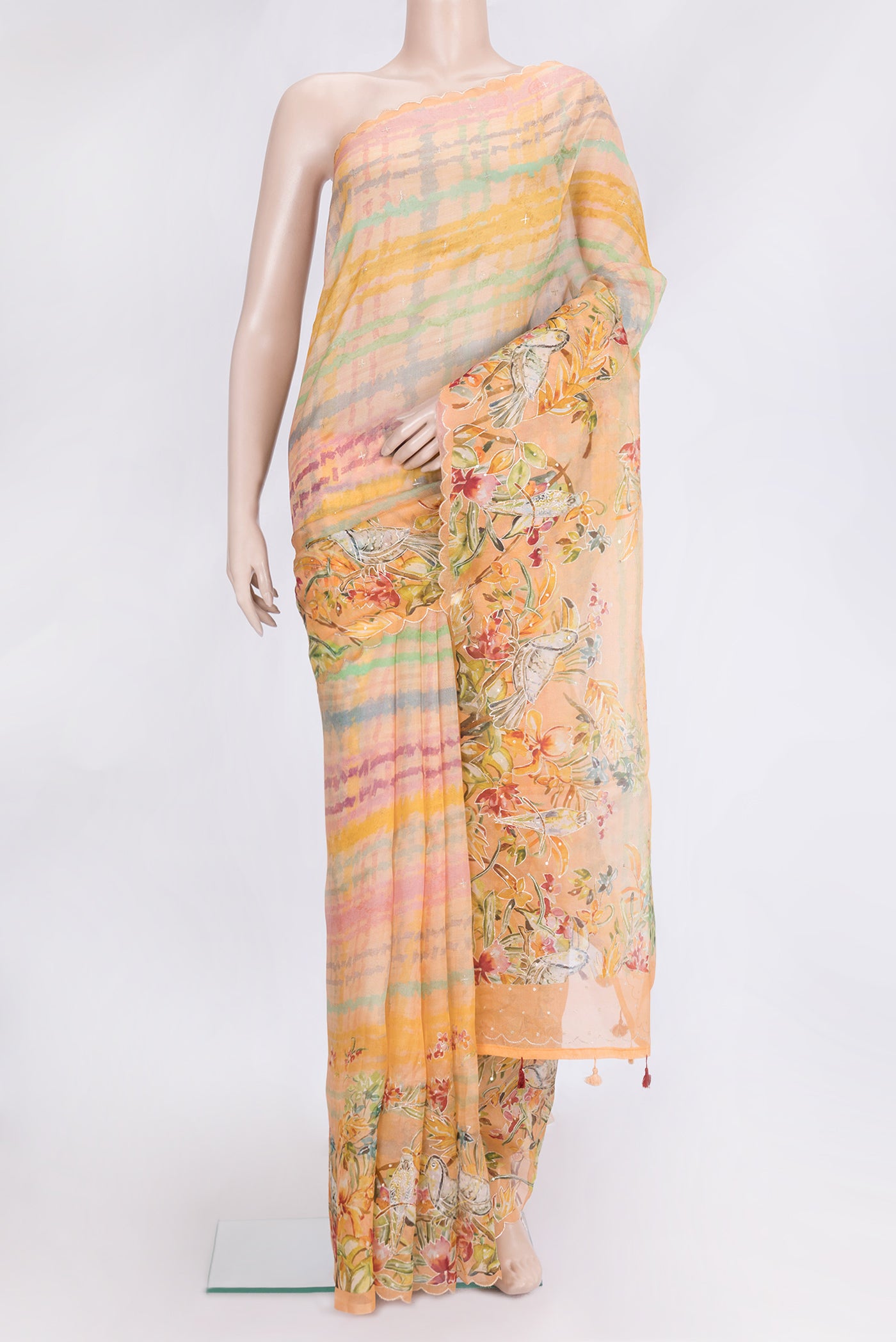 Orange Dual Tone Organza Silk Saree with Embroidery on the body and Embroidery Border.  displayed on a mannequin