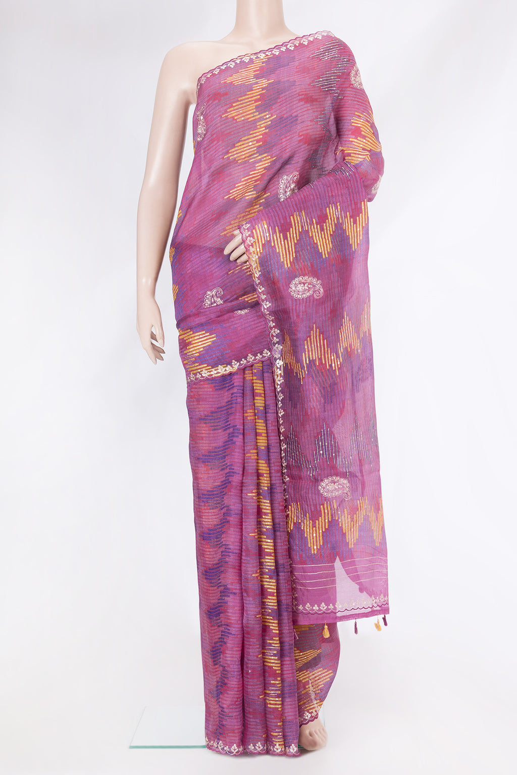Magenta Dual Tone Tussar Silk Saree with Embroidery on the body and Embroidery Border.  displayed on a mannequin