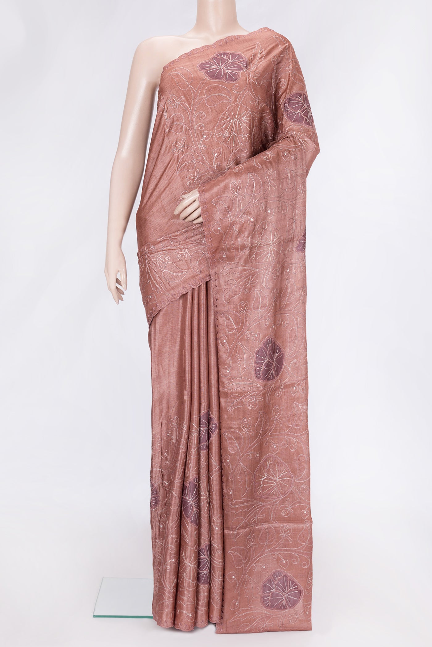 Golden Peach Dual Tone Tussar Silk Saree with Embroidery on the body and Embroidery Border.  displayed on a mannequin