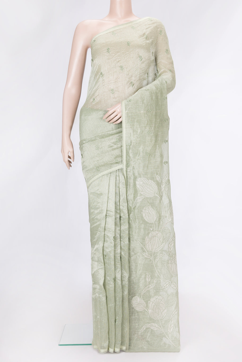 Pista Green Dual Tone Organza Silk Saree with Embroidery on the body and Embroidery Border.  displayed on a mannequin