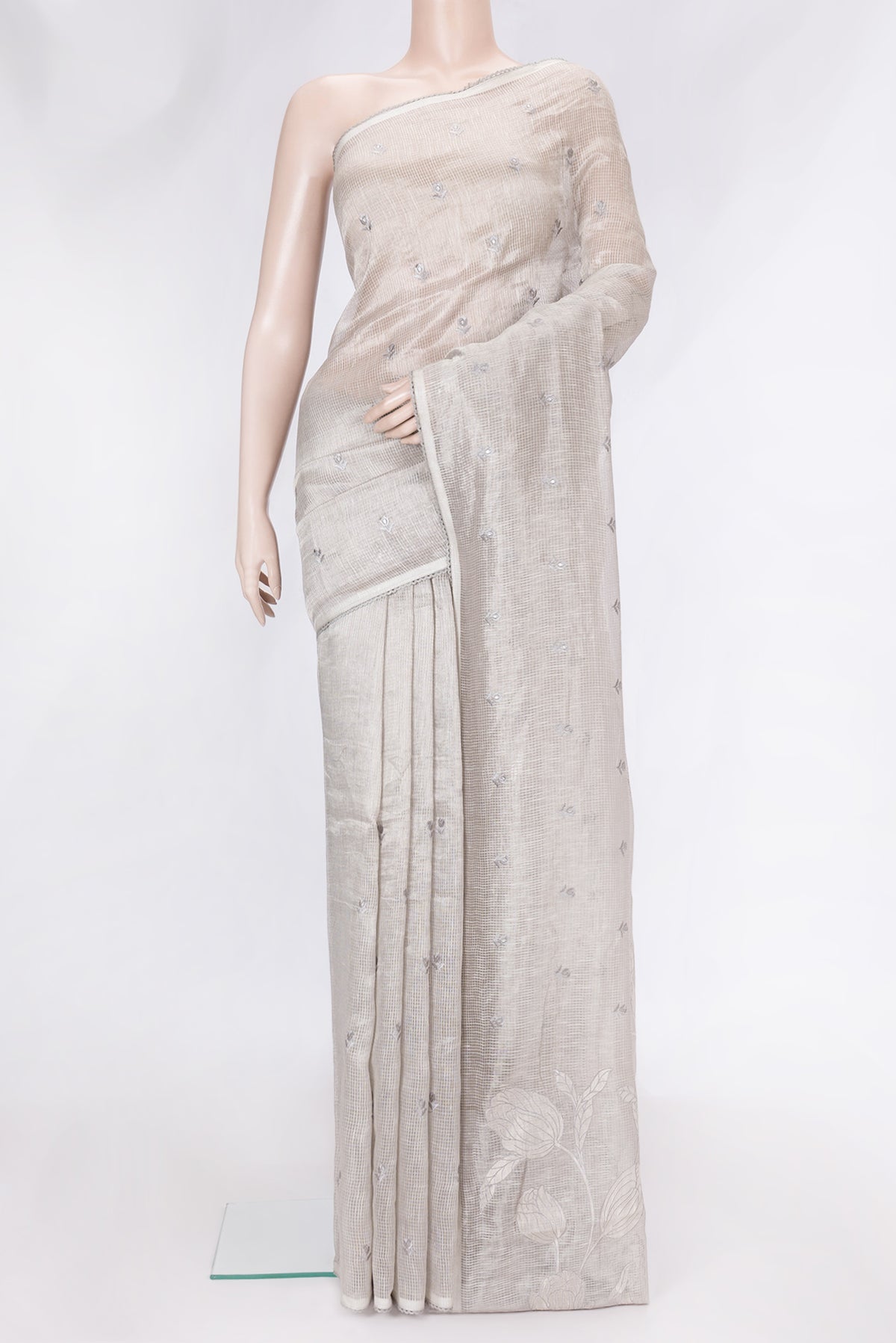 Grey Dual Tone Organza Silk Saree with Embroidery on the body and Embroidery Border.  displayed on a mannequin