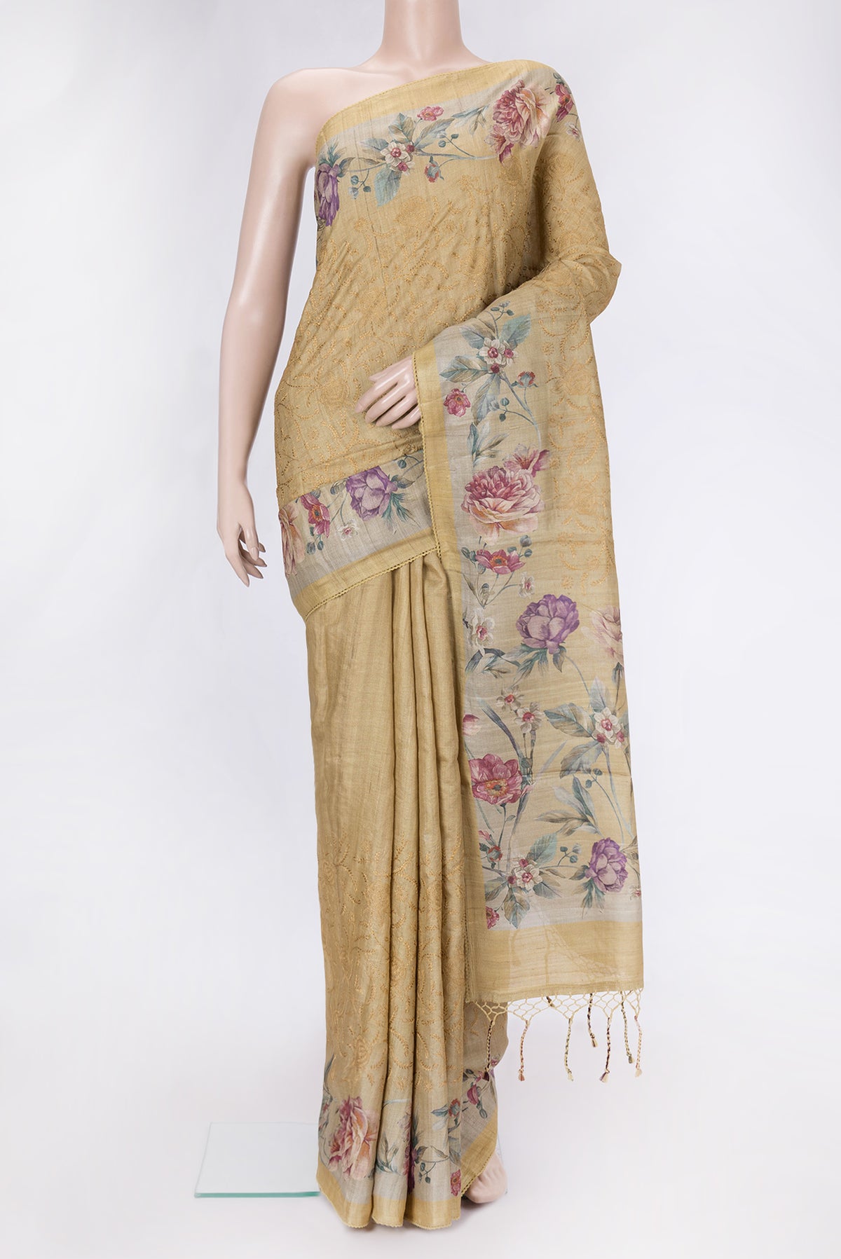 Sandal Dual Tone Tussar Silk Saree with Embroidery on the body and Printed Border.  displayed on a mannequin