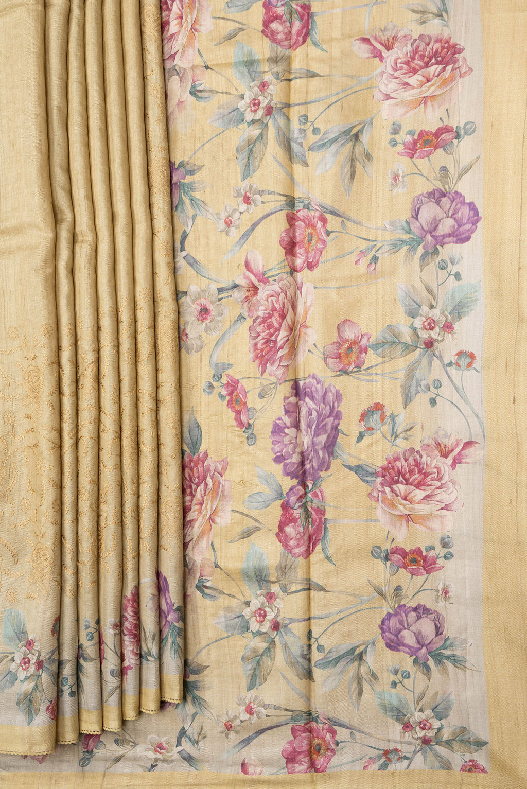 Pleats and pallu of Sandal Dual Tone Tussar Silk Saree with Embroidery on the body and Printed Border. 