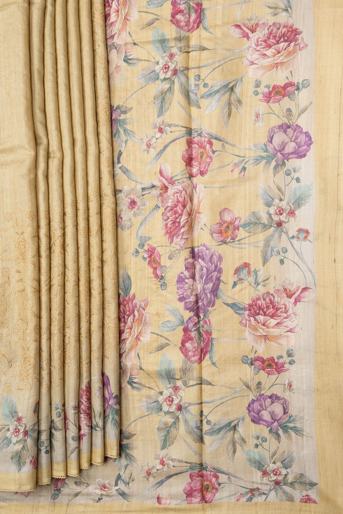 Pleats and pallu of Sandal Dual Tone Tussar Silk Saree with Embroidery on the body and Printed Border. 