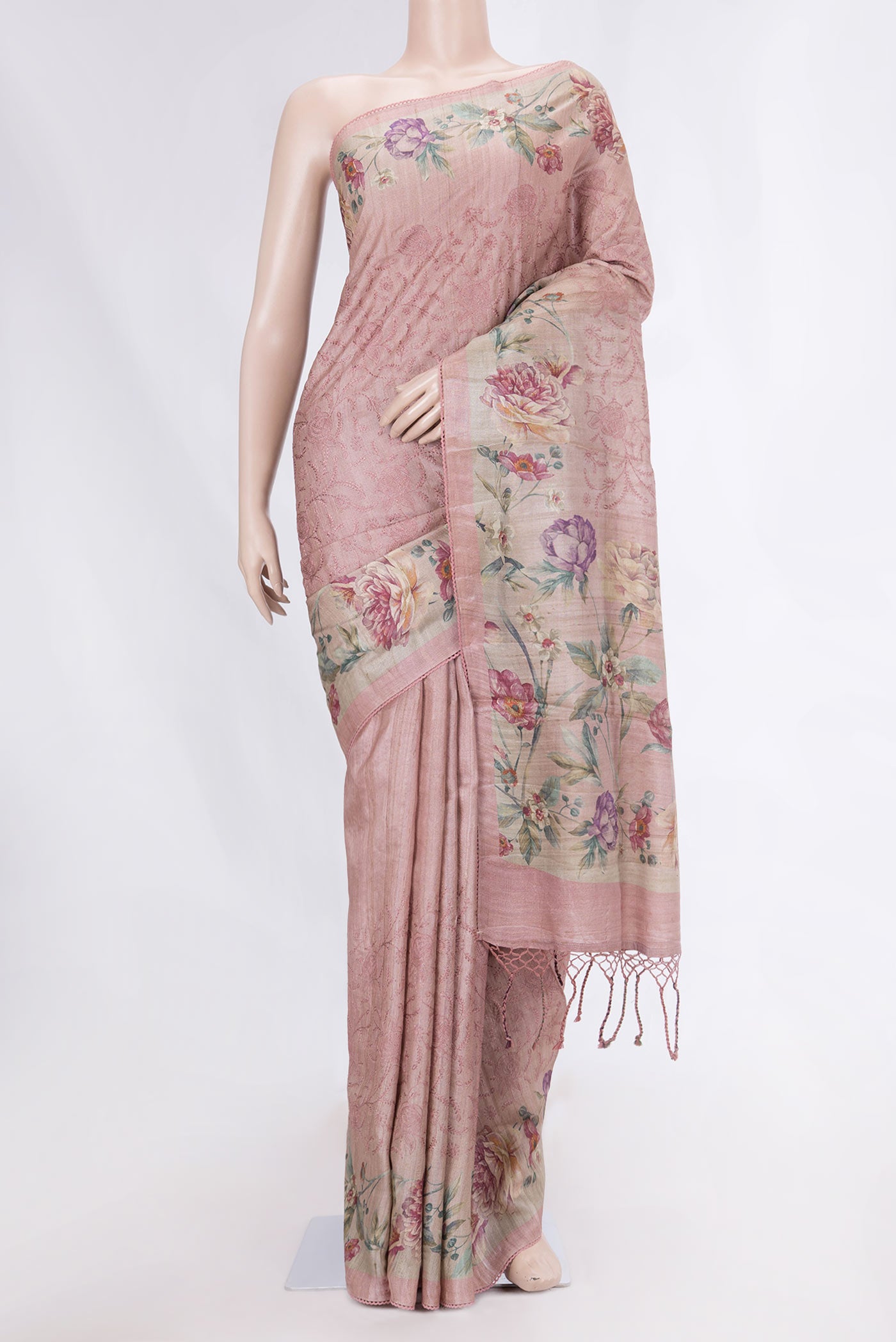 Rose Gold Tussar Silk Saree with Embroidery on the body and Printed Border displayed on a mannequin