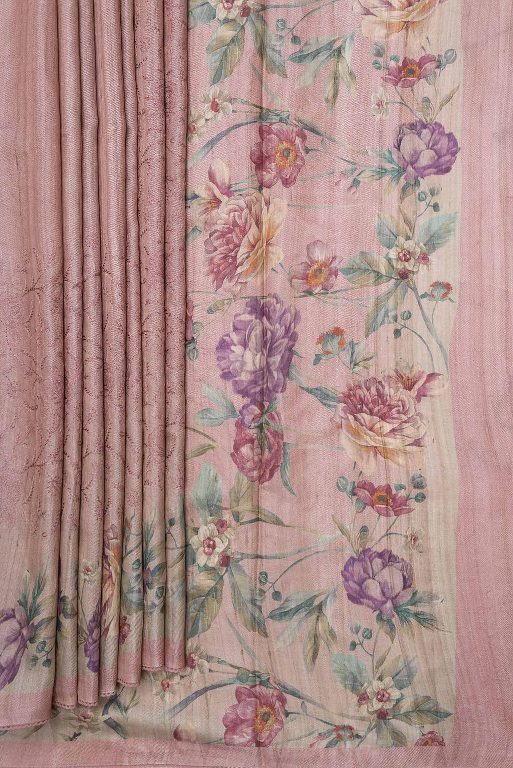 Pleats and pallu of Rose Gold Tussar Silk Saree with Embroidery on the body and Printed Border
