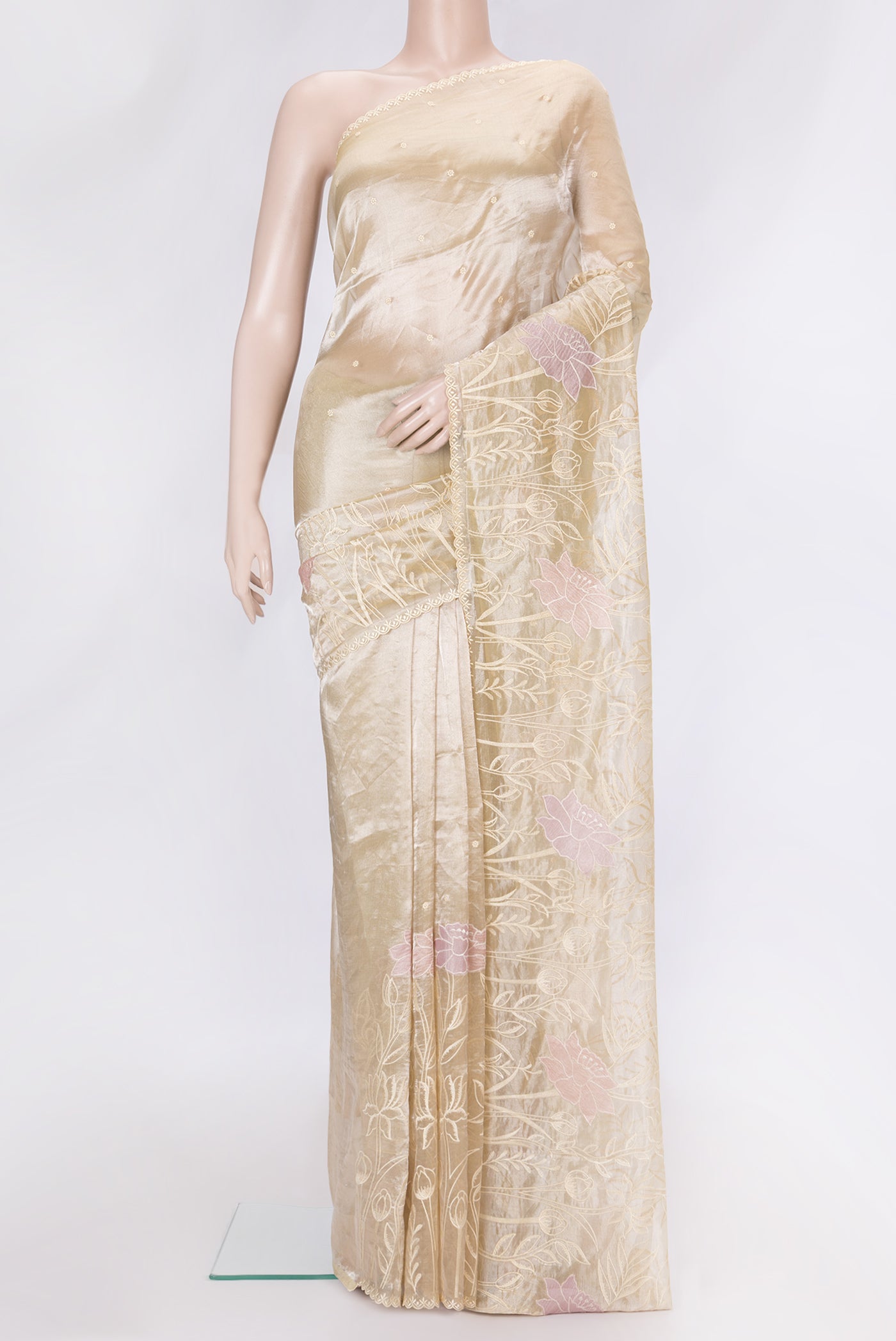 Gold Dual Tone Organza Silk Saree with Embroidery on the body and Embroidery Border.  displayed on a mannequin