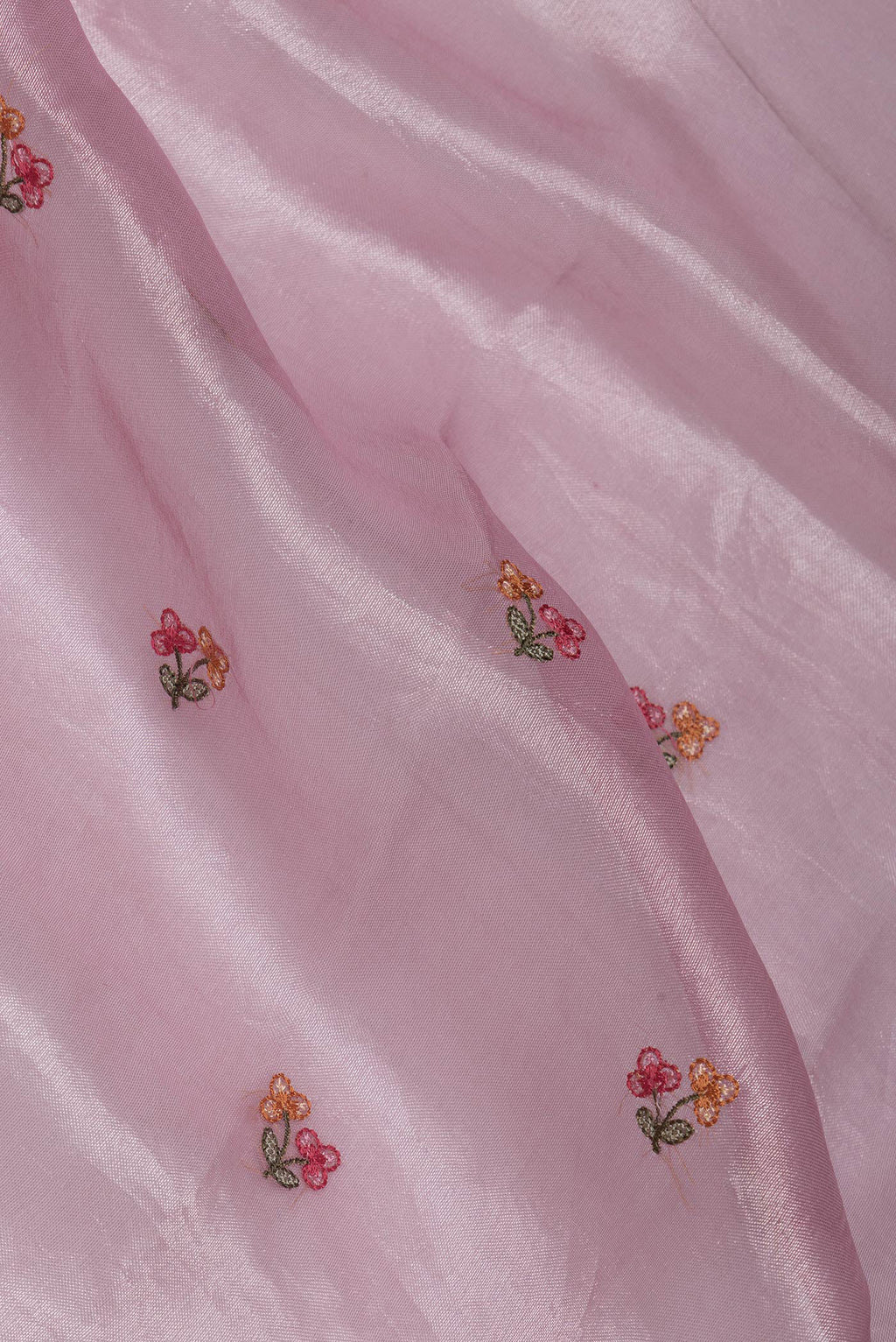 Close up of Pink Dual Tone Organza Silk Saree with Embroidery on the body and Embroidery Border.  displaying folds