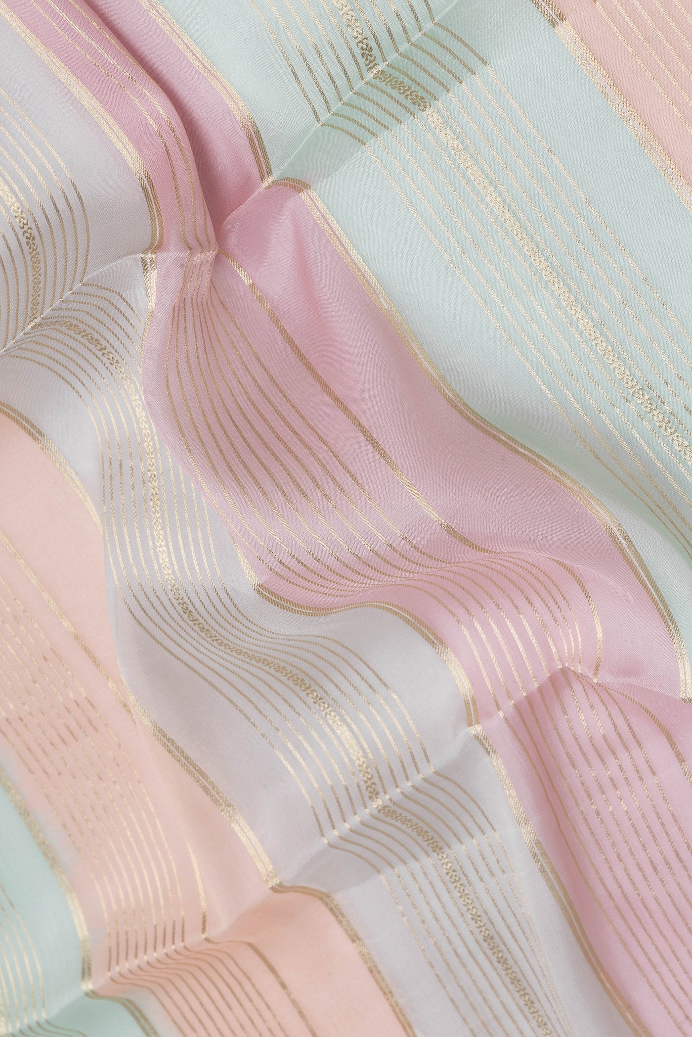 Close up of Multi Color Organza Silk Saree with Stripes on the body and Zari Border.  displaying folds