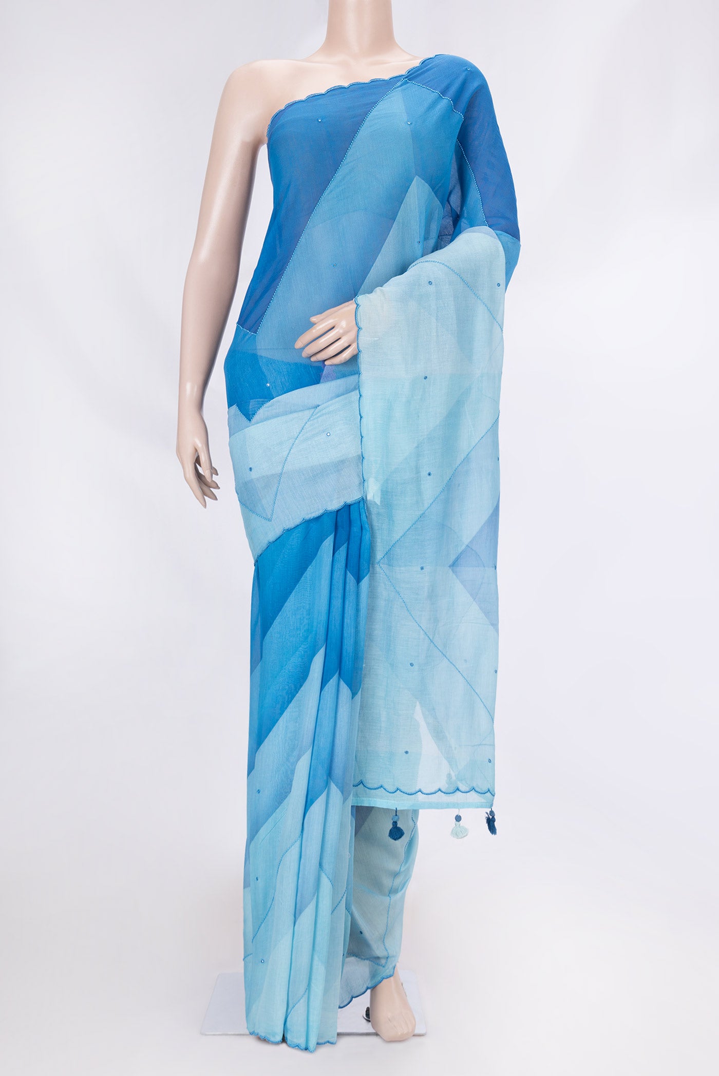 Blue Dual Tone Tussar Saree with Embroidery on the body and Embroidery Border displayed on a mannequin