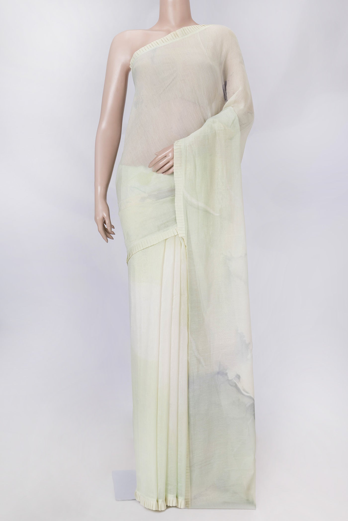 Pista Green Dual Tone Chanderi Silk Saree with Printed design on the body and Embroidery Border displayed on a mannequin