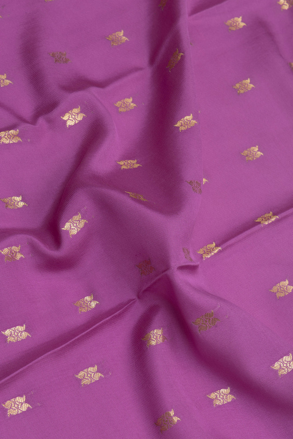 Close up of Purple Mysore Silk Saree with Zari Butta on the body and Zari Border.  displaying folds