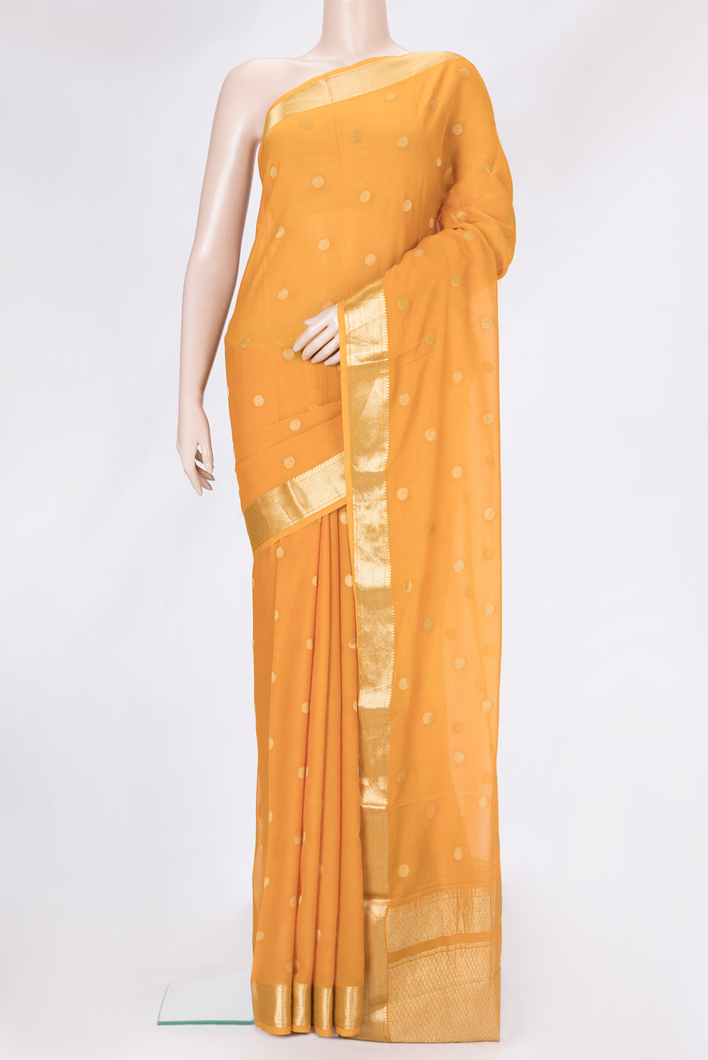 Mustard Dual Tone Georgette Saree with Zari Butta on the body and Zari Border.  displayed on a mannequin
