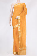 Mustard Dual Tone Georgette Saree with Zari Butta on the body and Zari Border.  displayed on a mannequin