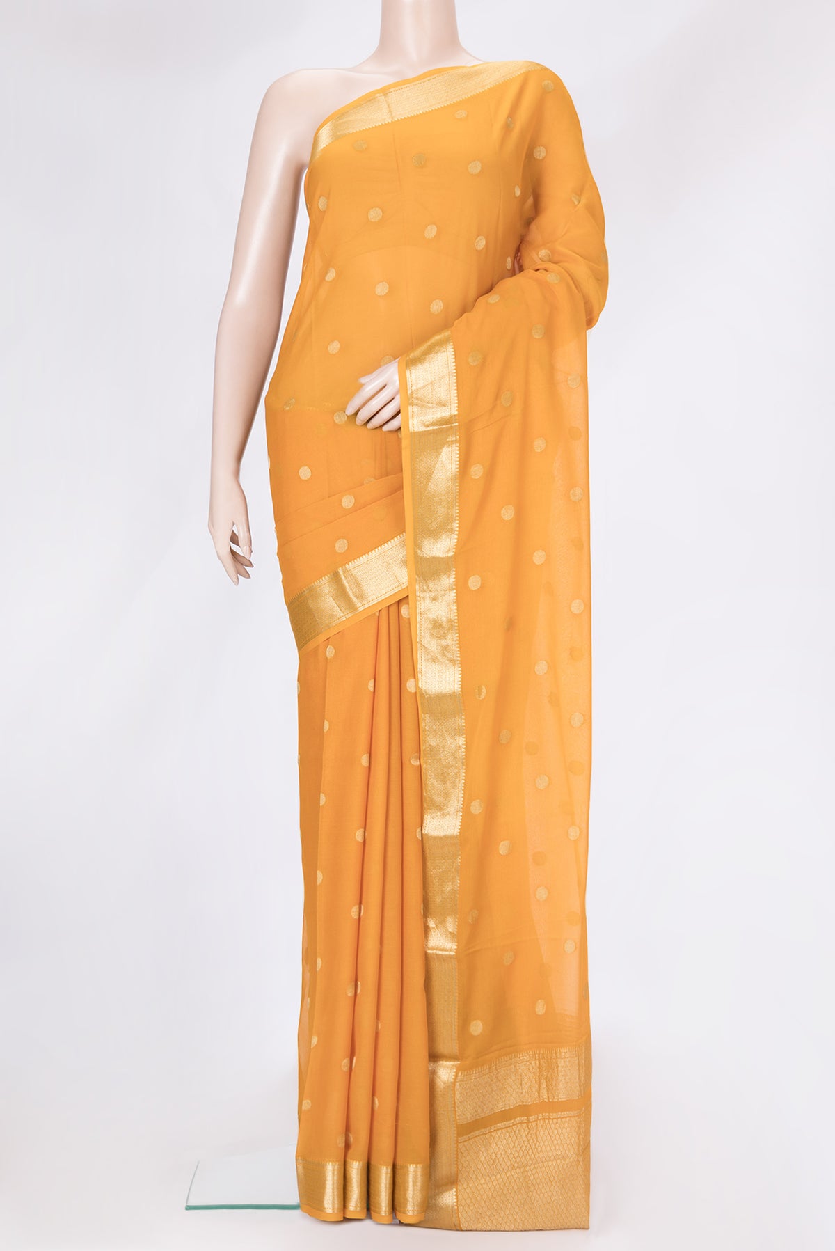 Mustard Dual Tone Georgette Saree with Zari Butta on the body and Zari Border.  displayed on a mannequin