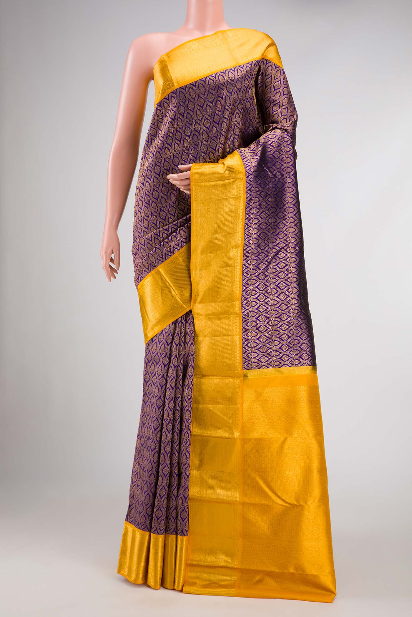 Navy Blue Dual Tone Kanjivaram Silk Saree with Zari Brocade on the body and Zari Border.  displayed on a mannequin