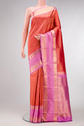 Brick Orange Dual Tone Kanjivaram Silk Saree with Zari Brocade on the body and Zari Border.  displayed on a mannequin