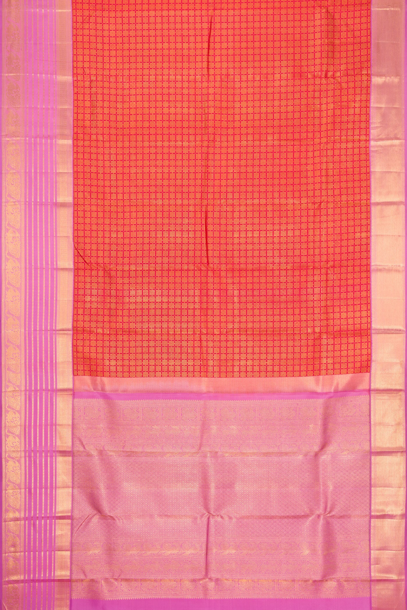 Flat view of Brick Orange Dual Tone Kanjivaram Silk Saree with Zari Brocade on the body and Zari Border. 