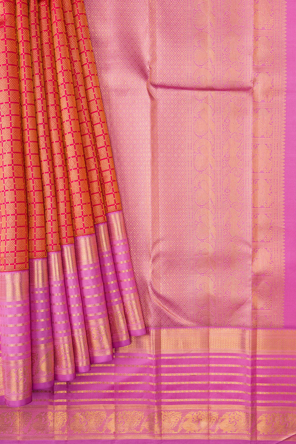 Pleats and pallu of Brick Orange Dual Tone Kanjivaram Silk Saree with Zari Brocade on the body and Zari Border. 