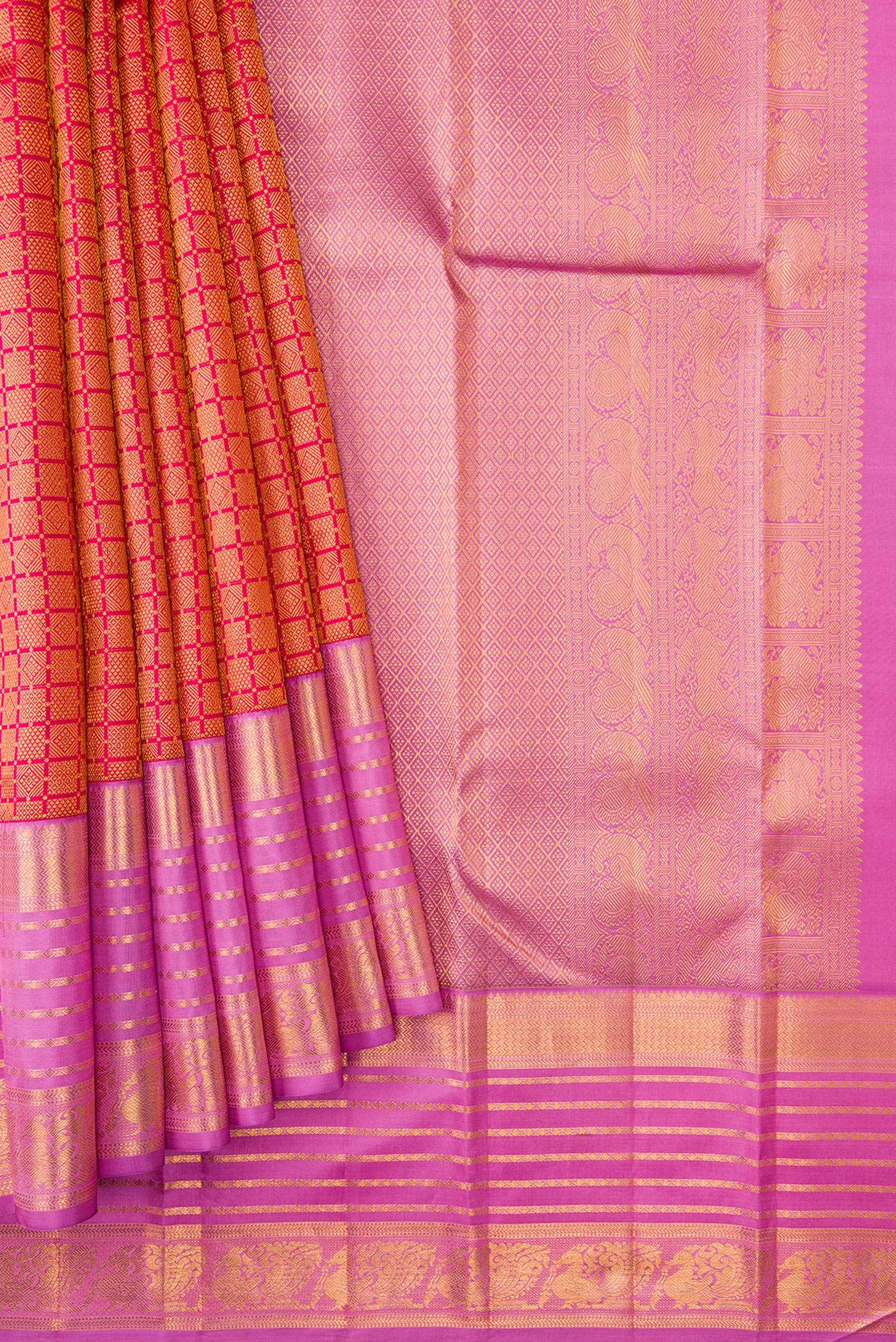 Pleats and pallu of Brick Orange Dual Tone Kanjivaram Silk Saree with Zari Brocade on the body and Zari Border. 