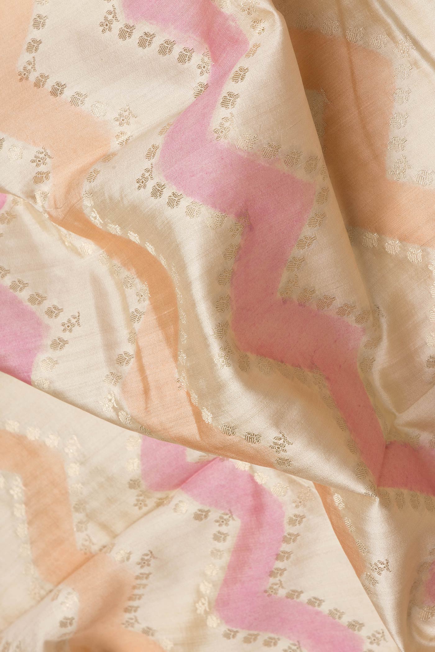 Border image of Pink, Orange and Sandal Color Tussar Silk Saree with Zig Zag design on the body and Zari Border. 
