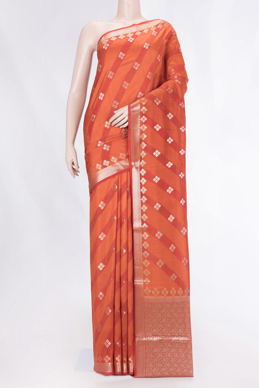 Orange Banarasi Raw Silk Saree with Zari Butta on the body and Zari Border displayed on a mannequin