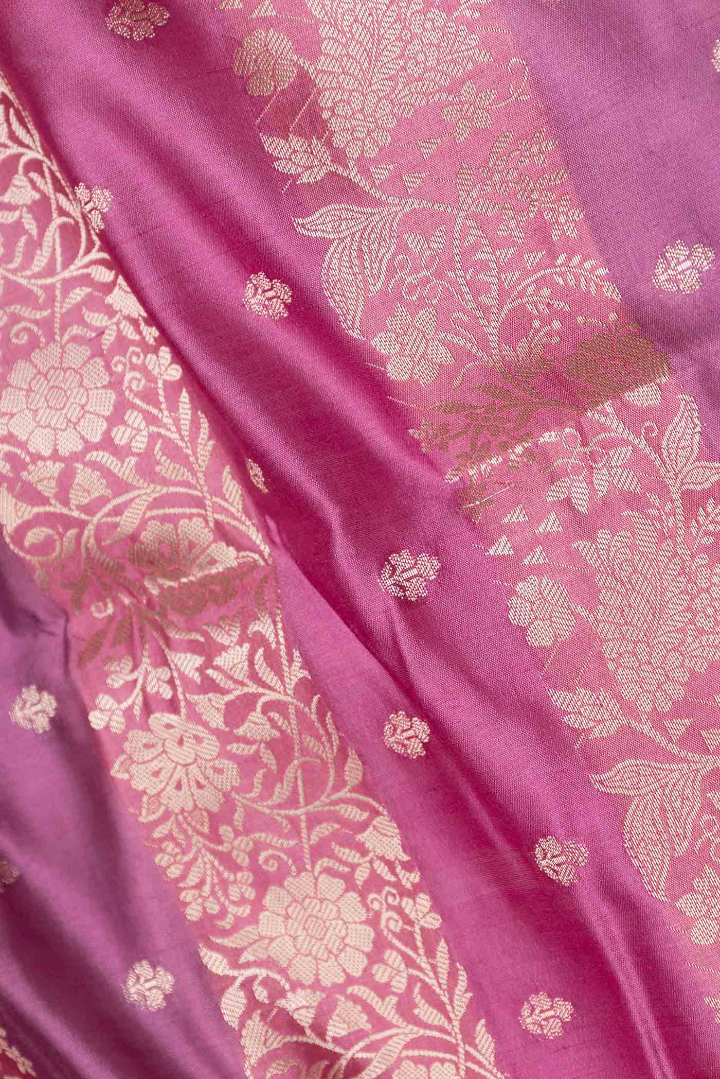 Close up of Multi Color Banarasi Raw Silk Saree with Stripes on the body and Zari Border displaying folds