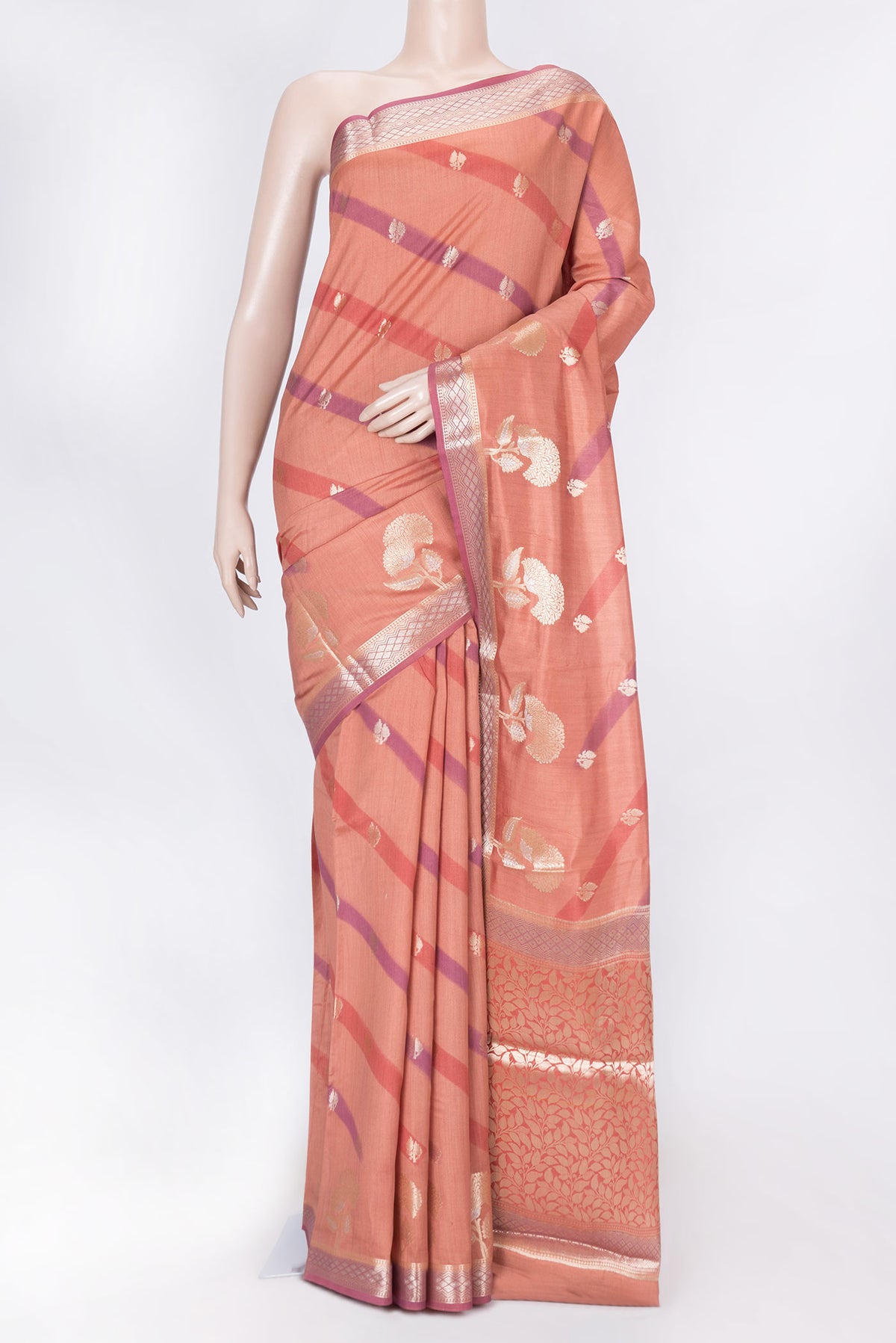 Rust Banarasi Raw Silk Saree with Zari Butta on the body and Zari Border displayed on a mannequin