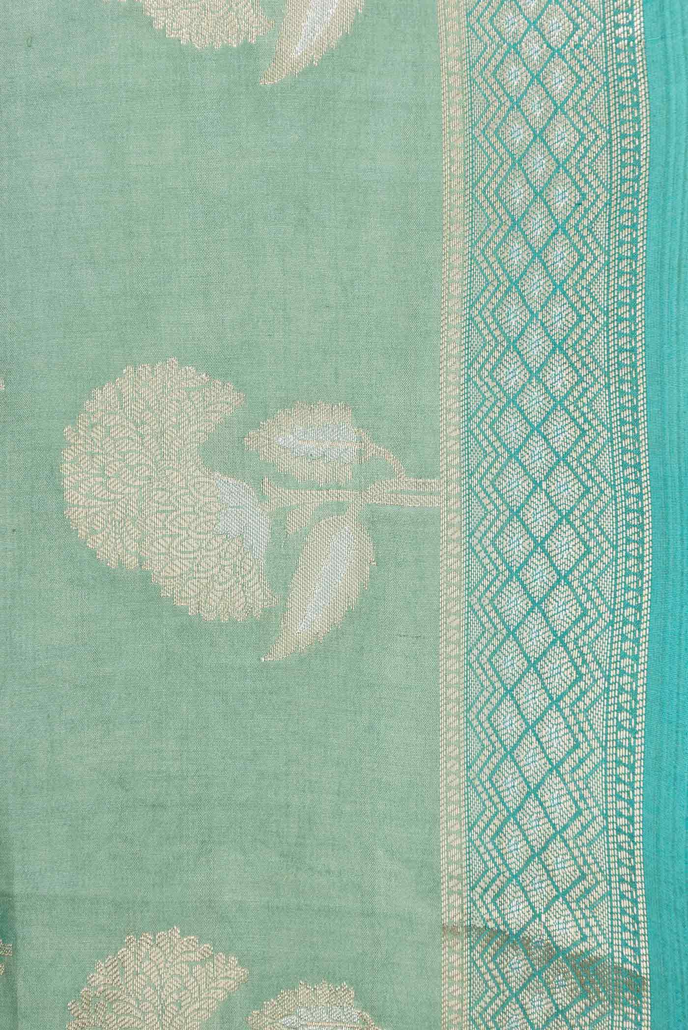 Border image of Green Dual Tone Tussar Silk Saree with Zari Butta on the body and Zari Border
