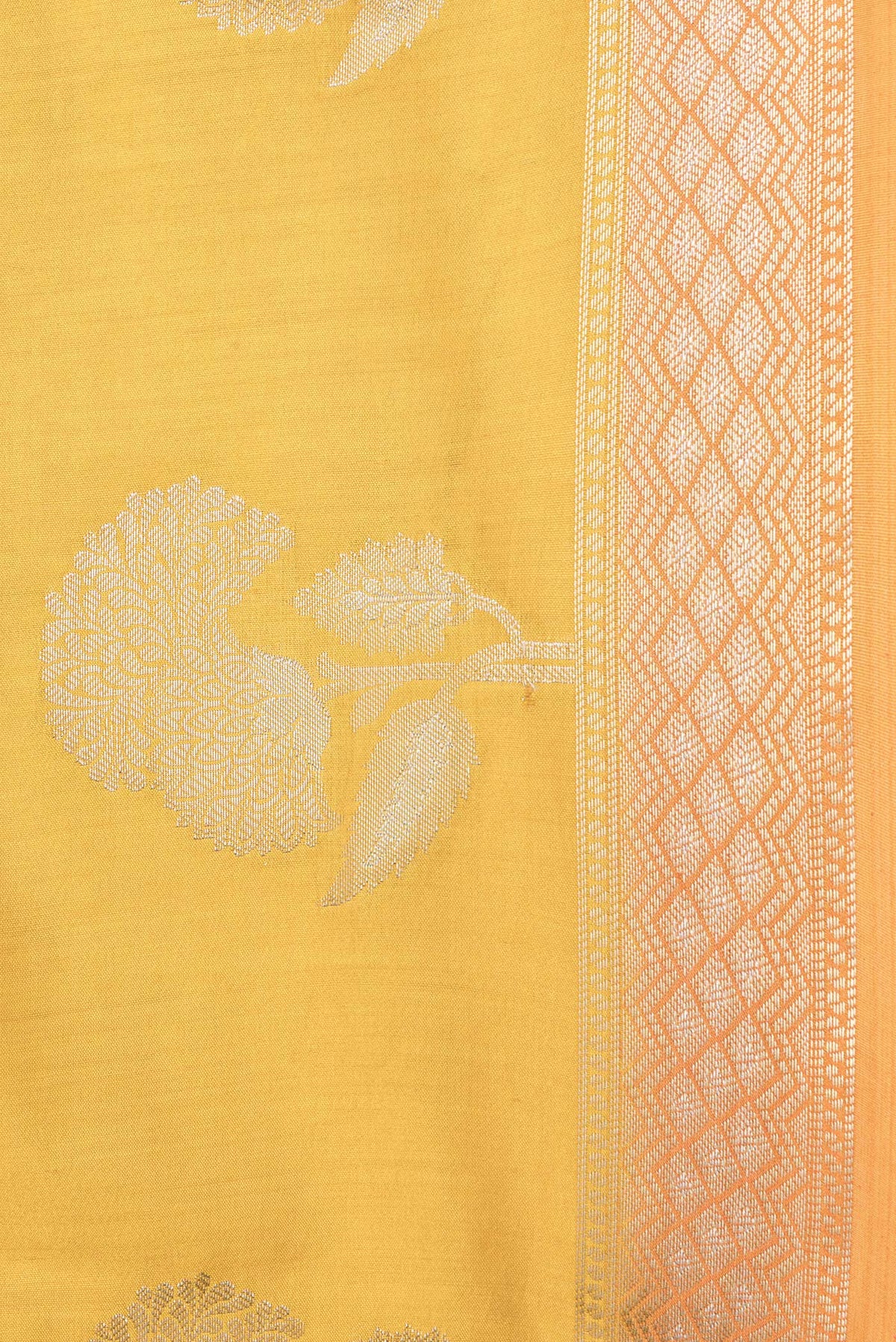Border image of Mustard Dual Tone Tussar Silk Saree with Zari Butta on the body and Zari Border. 