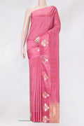 Pink Tussar Silk Saree with Zari Butta on the body and Fancy Border.  displayed on a mannequin