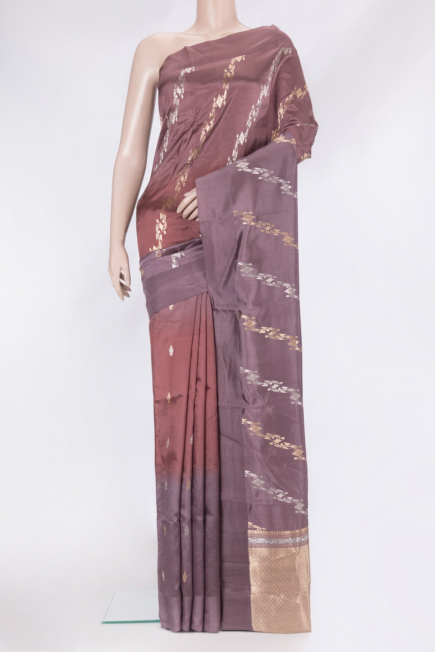 Multi Color Tussar Silk Saree with Zari Butta on the body and Plain Border.  displayed on a mannequin