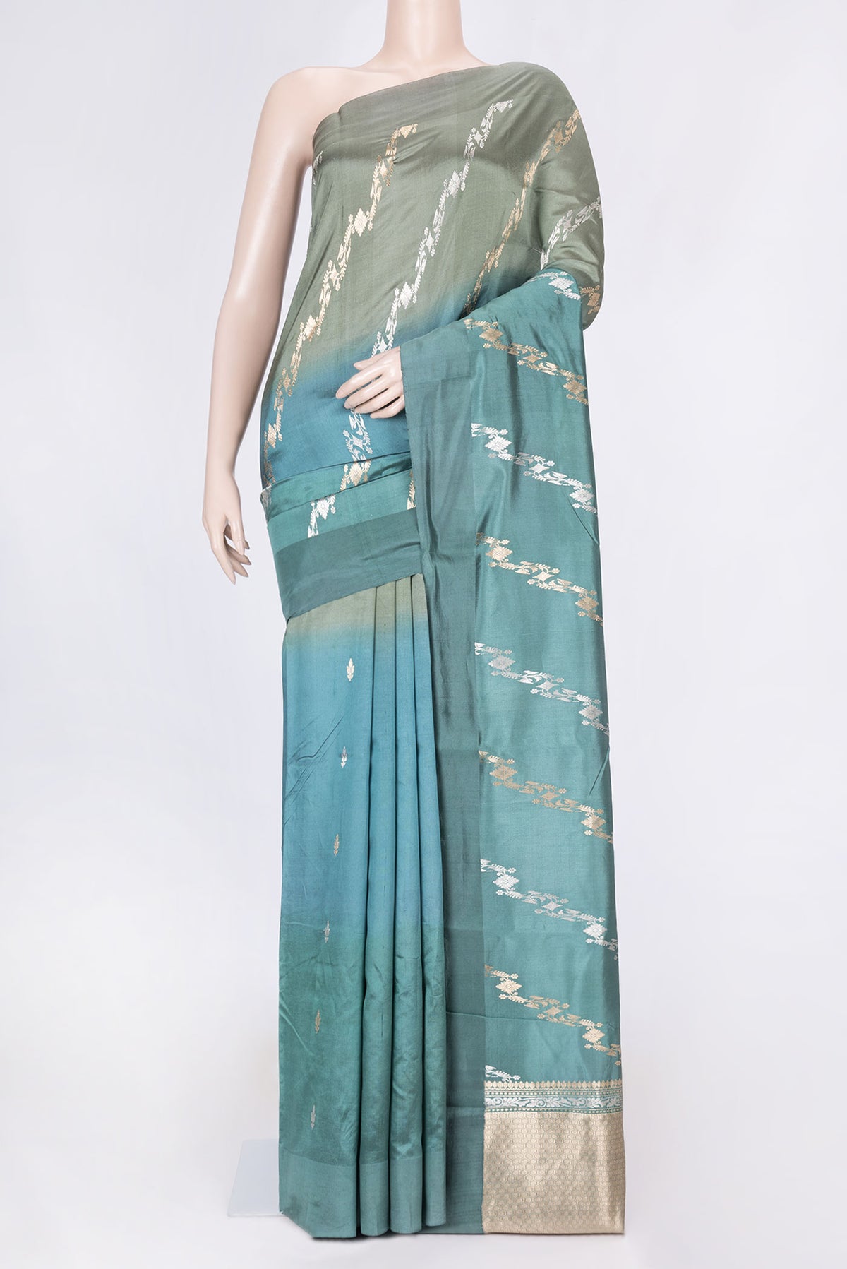 Blue Grey Dual Tone Tussar Silk Saree with Zari Brocade on the body and Without Border displayed on a mannequin