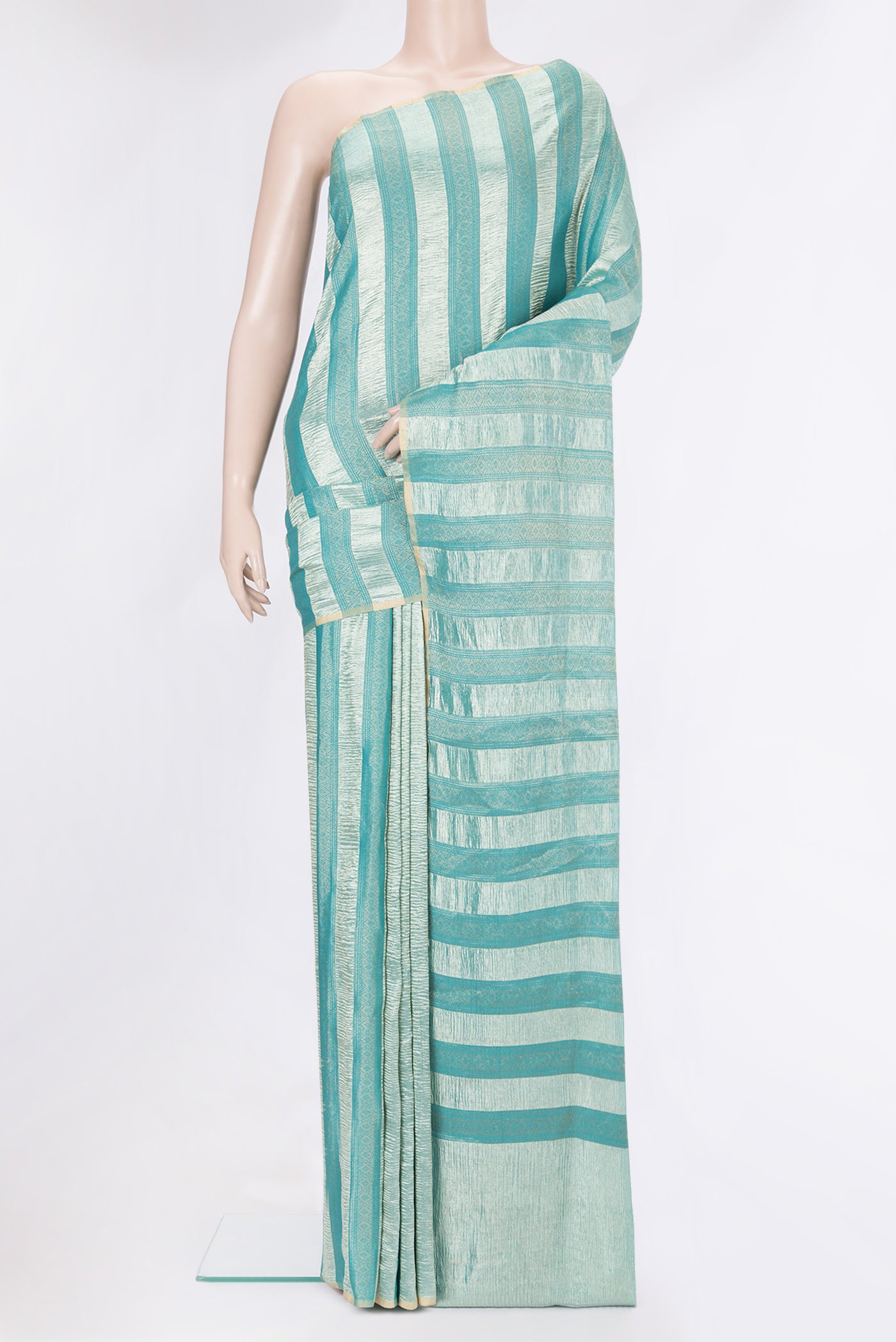 Sky Blue Dual Tone Tussar Silk Saree with Stripes on the body and Zari Border.  displayed on a mannequin