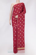 Maroon Dual Tone Tussar Silk Saree with Zari Butta on the body and Zari Border.  displayed on a mannequin