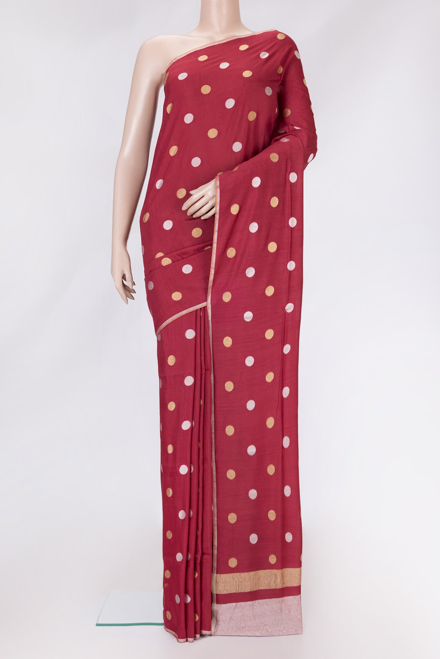 Maroon Dual Tone Tussar Silk Saree with Zari Butta on the body and Zari Border.  displayed on a mannequin