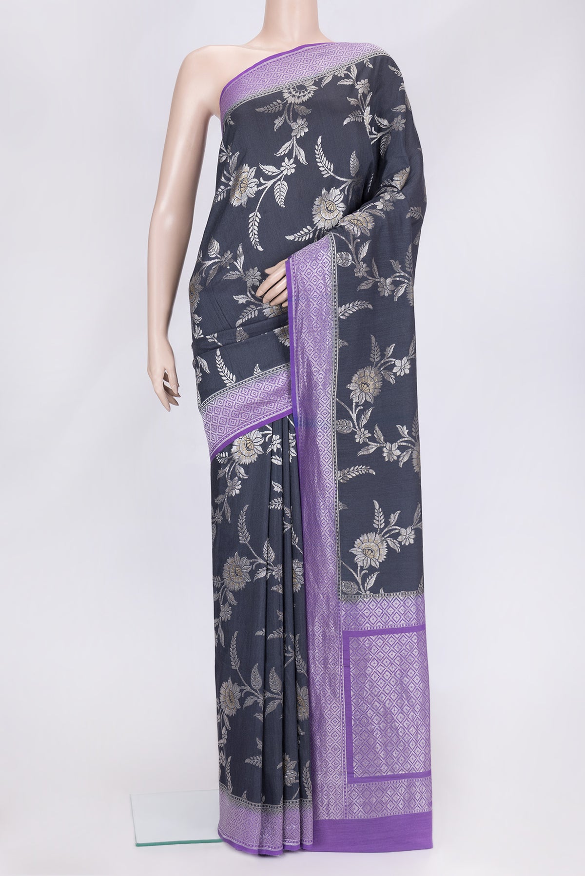 Grey Dual Tone Tussar Silk Saree with Zari Brocade on the body and Zari Border.  displayed on a mannequin
