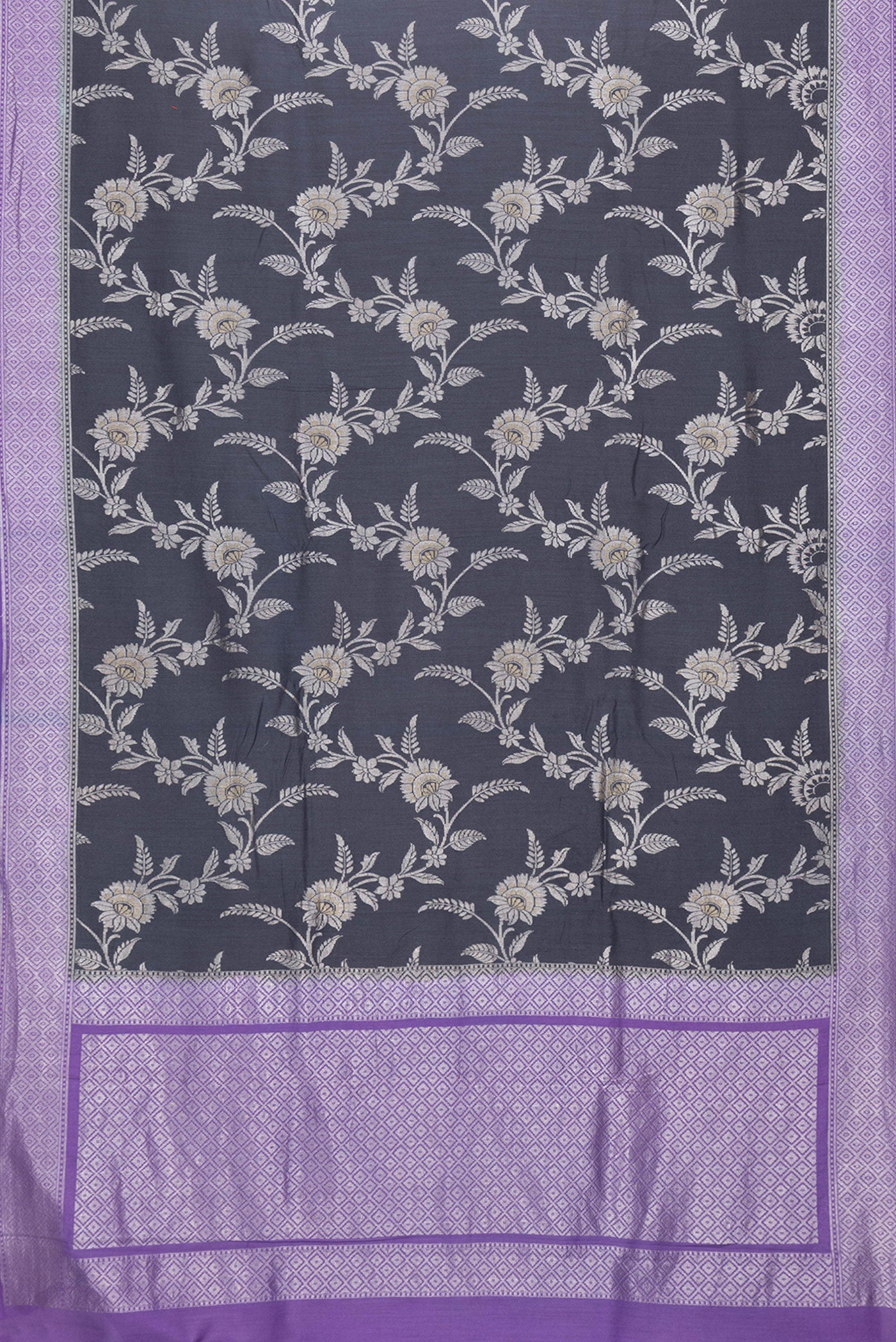 Flat view of Grey Dual Tone Tussar Silk Saree with Zari Brocade on the body and Zari Border. 