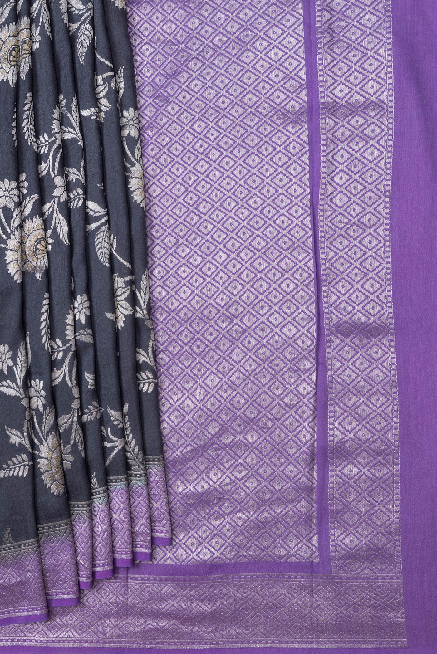 Pleats and pallu of Grey Dual Tone Tussar Silk Saree with Zari Brocade on the body and Zari Border. 